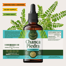 Flacon HERBAMAMA Chanca Piedra avec un verre de jus à côté