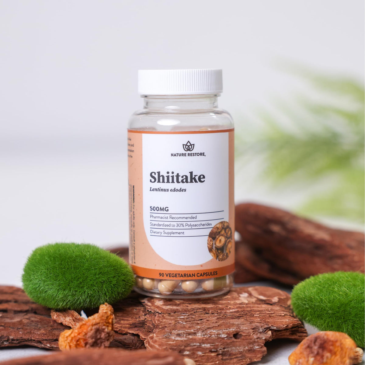 Flacon Nature Restore Shiitake avec capsules à côté