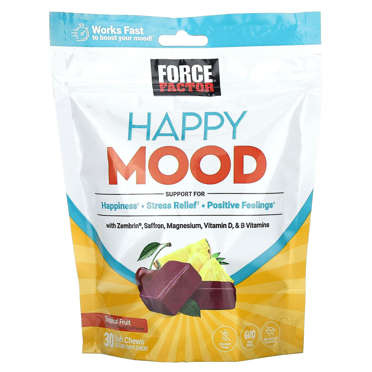 Force Factor Happy Mood Soft Chews sur une table avec des fruits tropicaux