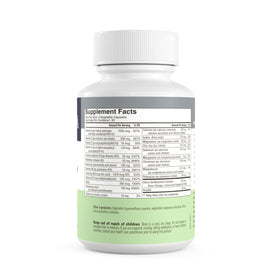 FREEDA Multivitamines Adultes sur un bureau avec des fruits