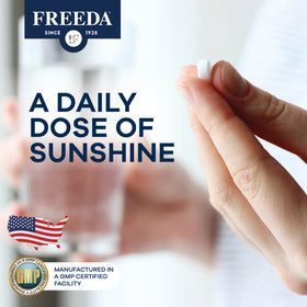 FREEDA Vitamine D2 2000 UI Vegan comprimés dans une main