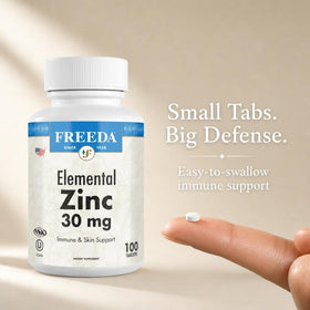 FREEDA Zinc Élementaire 30mg, comprimés sur une surface blanche