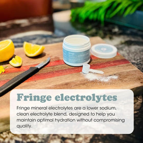 Fringe Poudre d'Électrolytes Non Aromatisée, mélange dans un verre d'eau