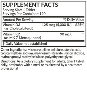 Futurebiotics Vitamine K2 MK-7 et D3 5000 UI, comprimés dans une main