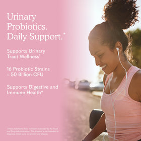 Garden of Life Probiotiques Urinary Tract+ capsules à côté d'une bouteille d'eau