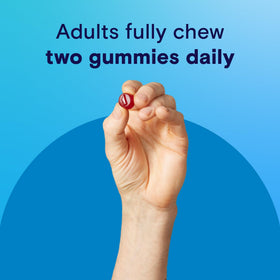 Gélifiés ONE A DAY 50+ avec fruits frais en arrière-plan
