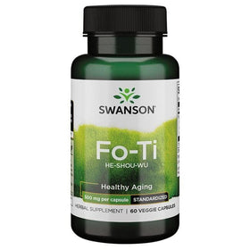 Gélule de Swanson Fo-Ti 500 mg à côté d'une main