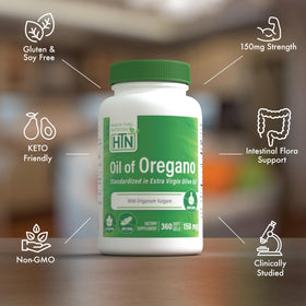 Gélules d'huile d'origan Health Thru Nutrition dans une main