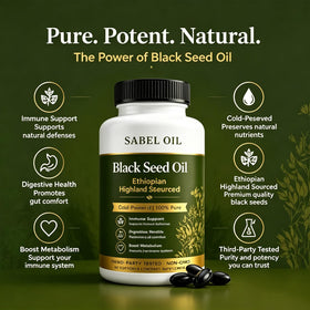 Gélules d'huile de graines noires Sabel Oil sur une surface en bois