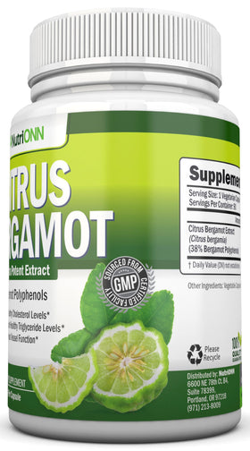 Gélules de Citrus Bergamot dans une main