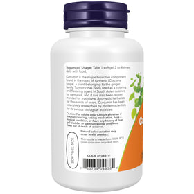 Gélules de curcuma NOW Foods sur une table en bois