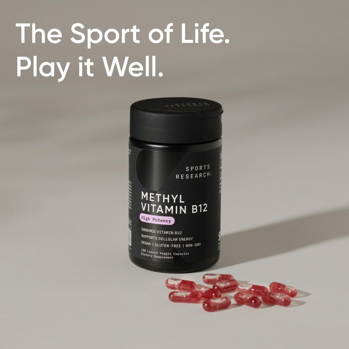 Gélules de Vitamine B12 Methylcobalamine Sports Research avec une main