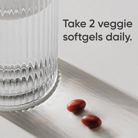 Gélules de Vitamines B-Complex Sports Research sur fond blanc