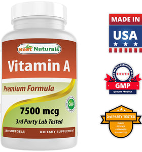 Gélules molles de Vitamine A sur une table en bois