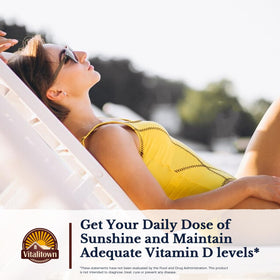 Gélules molles de Vitamine D3 Vitalitown dans une main
