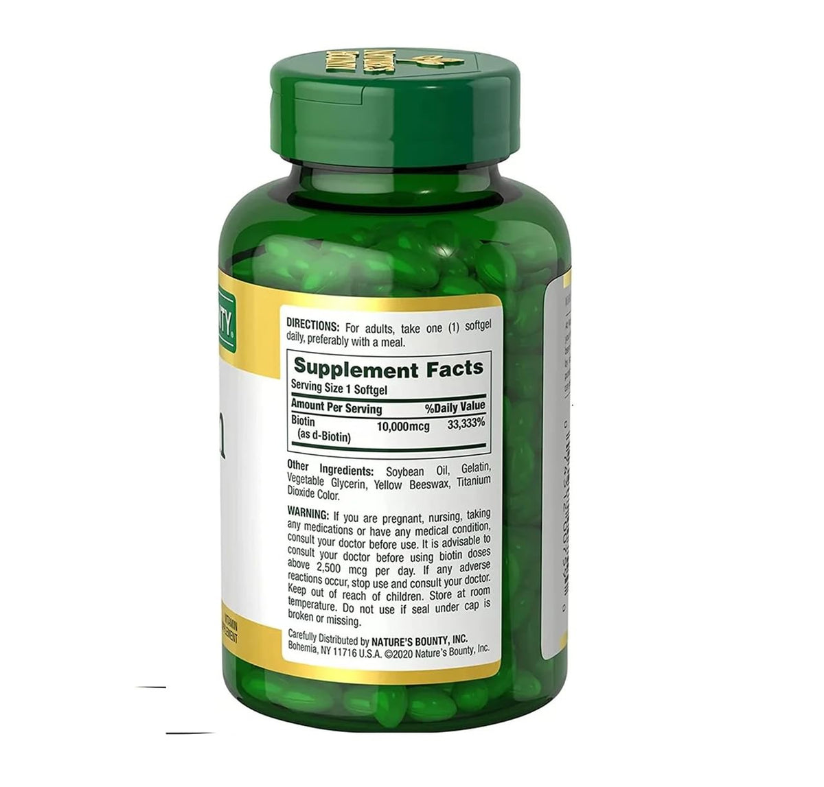 Gélules Nature's Bounty Biotine 10 000 mcg dans une main