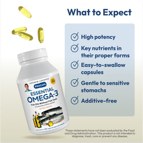 Gélules Omega-3 orange dans une main, mise en scène