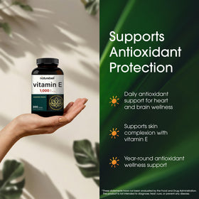 Gélules végétariennes NatureBell Vitamine E 1 000 UI dans une cuillère