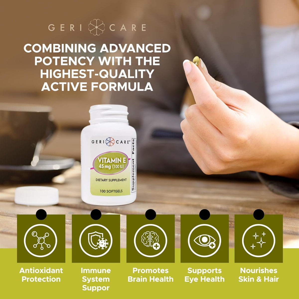 GeriCare Vitamine E 100 IU gélules à côté d'un verre d'eau