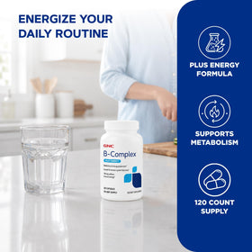 GNC B-Complex Plus Energy capsules sur une surface blanche