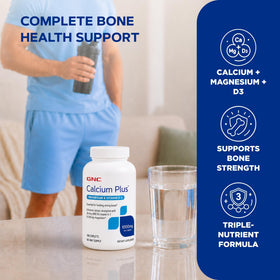 GNC Calcium Plus Magnésium & Vitamine D-3 1000mg comprimés dans un verre