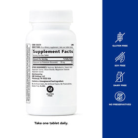 GNC Gluconate de Potassium 99mg comprimés dans une main