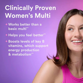 GNC Multivitamines Ultra Mega Femmes comprimés avec un verre d'eau