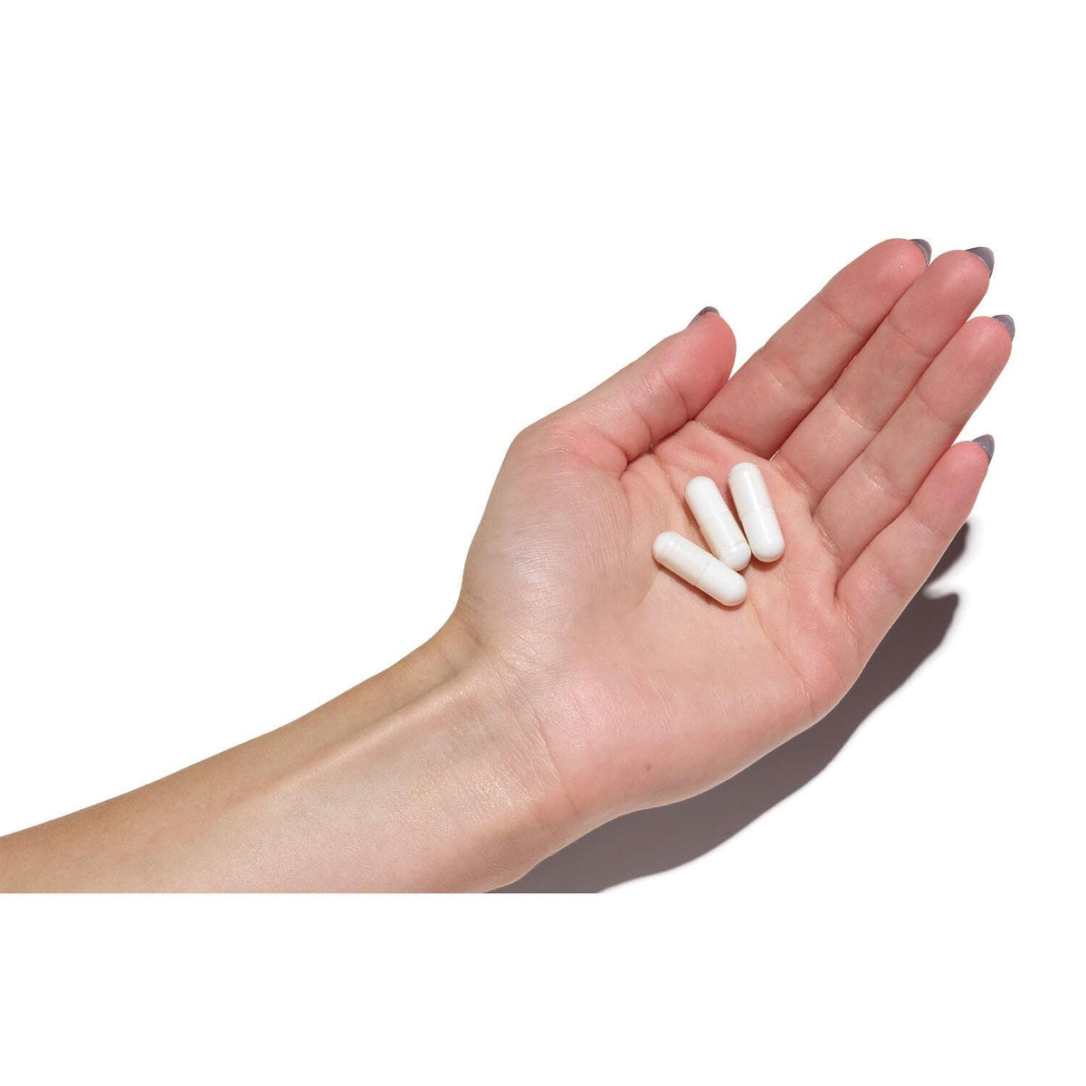 GNC Super Magnesium 300mg capsules sur fond blanc