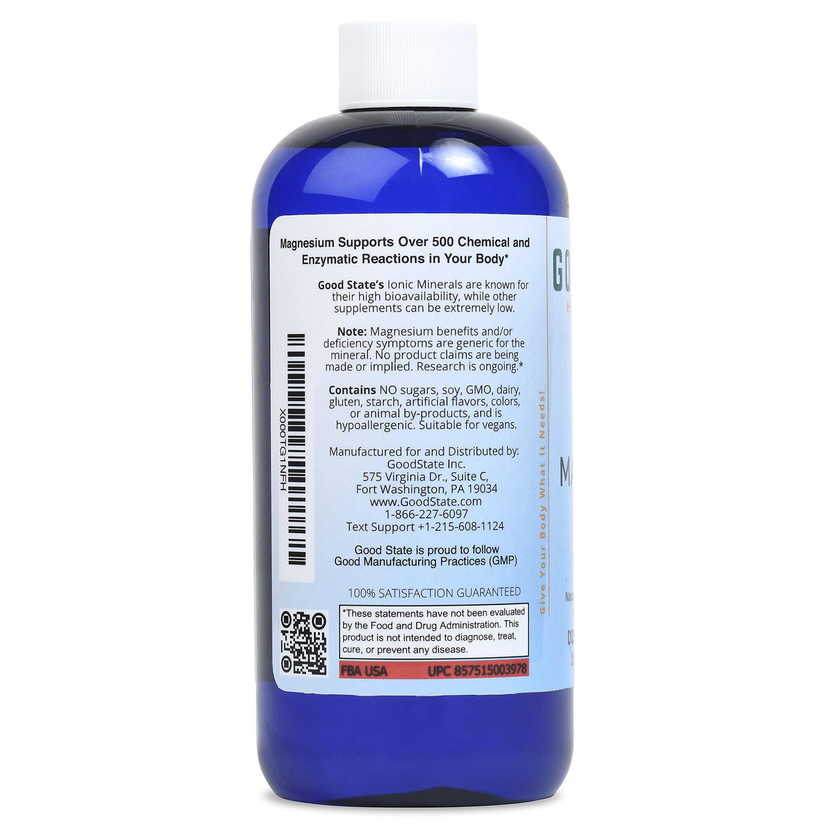 Good State magnésium ionique 16 oz bouteille à côté d'un verre d'eau