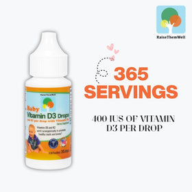 Goutte de vitamine D et K Raise Them Well sur une cuillère