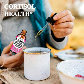 Gouttes AMENQ hHEALTH mélangées dans un smoothie