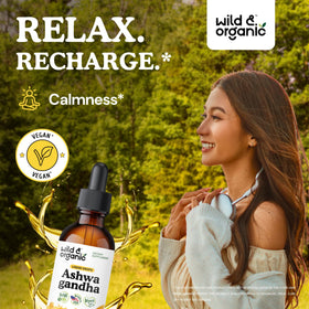 Gouttes d'extrait d'ashwagandha Wild & Organic sur une cuillère