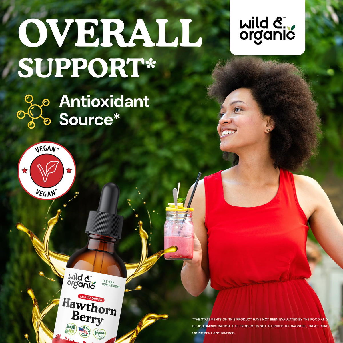 Gouttes d'extrait de baies de aubépine Wild & Organic sur une cuillère