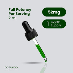 Gouttes de chlorophylle liquide DORADO NUTRITION sur une table en bois