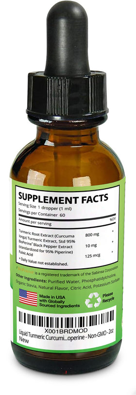 Gouttes de curcuma MaxX Labs versées dans un verre d'eau