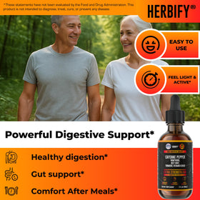 Gouttes de poivre de cayenne HERBIFY sur une table en bois