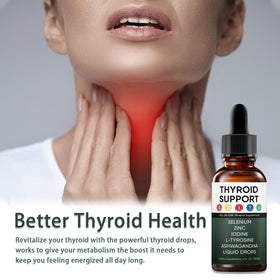 Gouttes de soutien thyroïdien GXSAE sur une table avec un verre d'eau