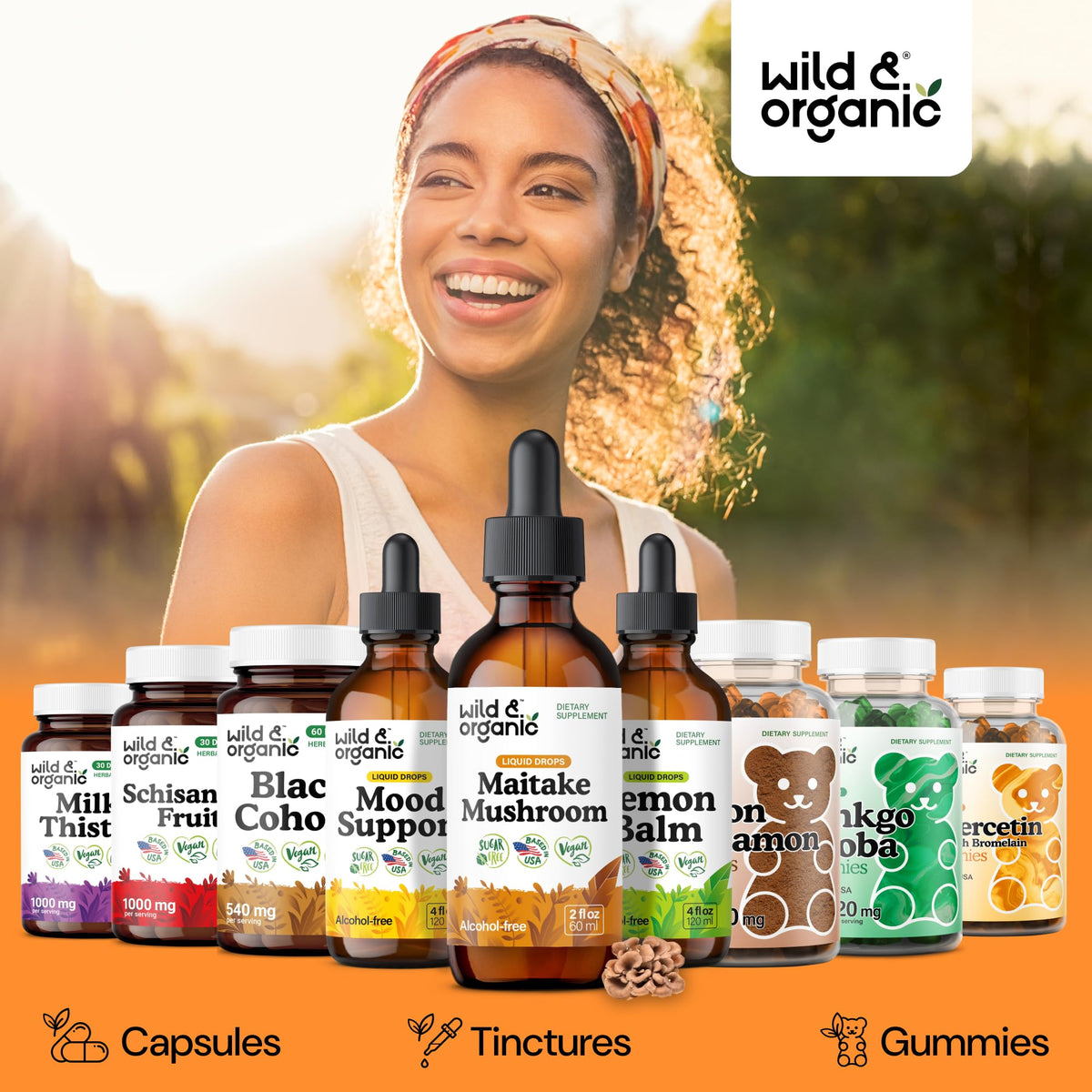 Gouttes de teinture de champignon maitake Wild & Organic versées dans un verre