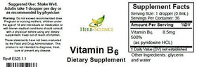 Gouttes de vitamine B6 Herb-Science versées dans une cuillère