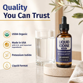 Gouttes liquides d'iode 1 Body sur une table