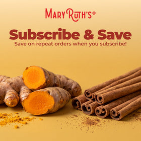 Gouttes liquides de curcuma MARYRUTH'S sur une table en bois