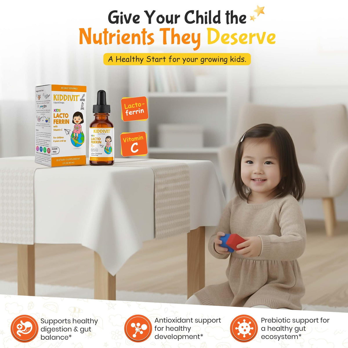 Gouttes liquides Kiddivit sur une table avec des fruits