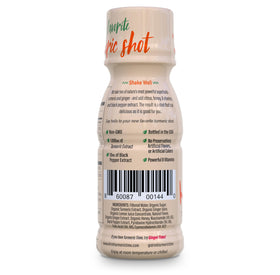 Gros plan sur un shot de curcuma Turmeric Time