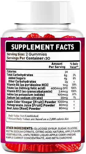 Gumitide Gummies OVICIA sur une table en bois