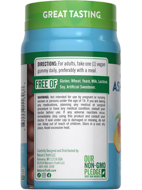 Gummies Ashwagandha Nature's Truth sur une table avec des plantes