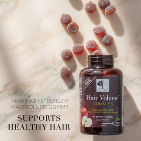 Gummies Biotin Cheveux NEW NORDIC à côté d'une pomme
