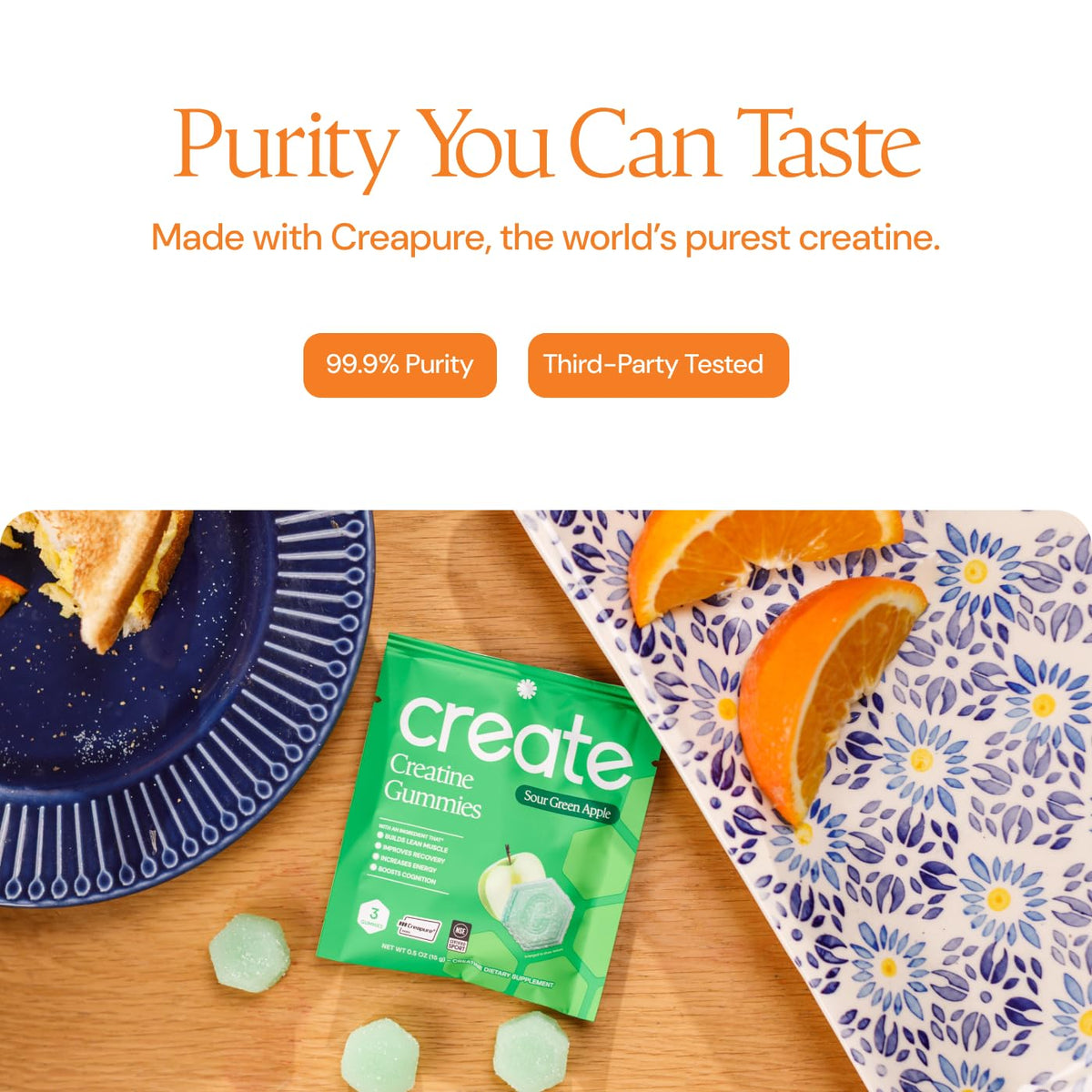 Gummies de créatine Create, présentation avec fruits à côté