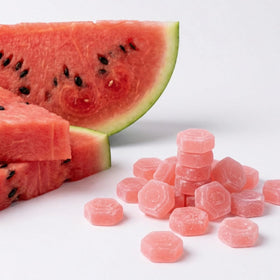 Gummies de Créatine Monohydrate Create avec une main tenant un gummy