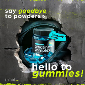 Gummies de créatine Thinbi sur une table avec un fond neutre