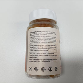 Gummies de curcuma WACHRAY dans une main